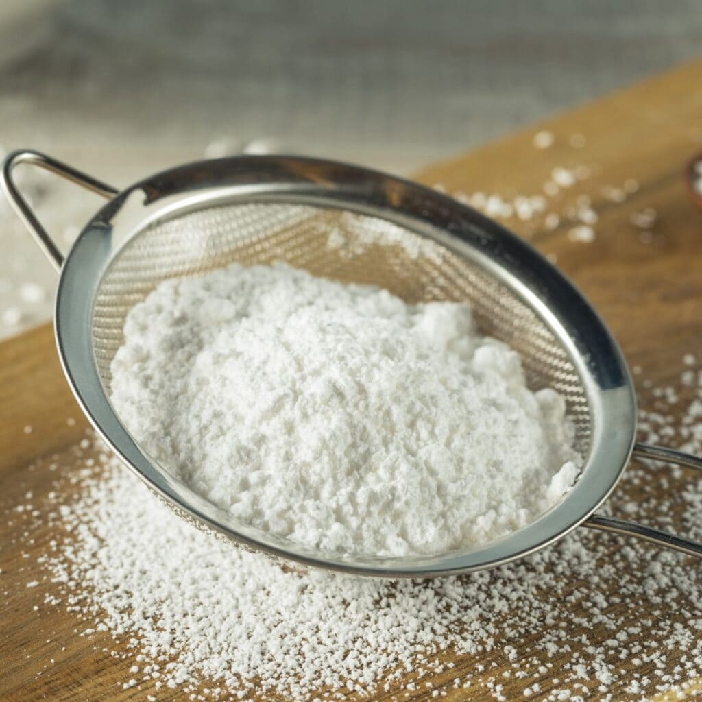 Sweet Powdered Sugar in a Sieve