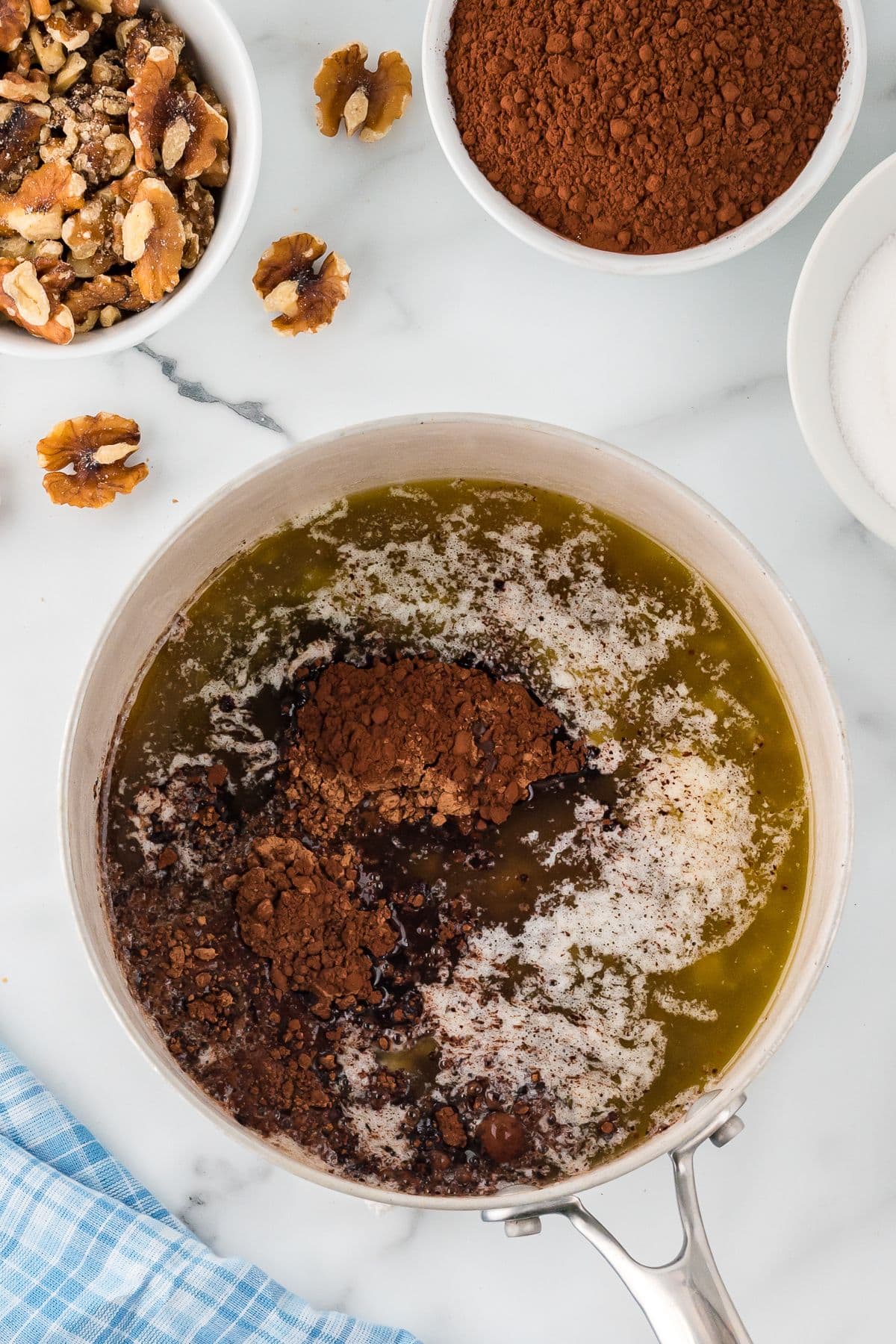 Butter, cocoa and water mixed in a sauce pan, 