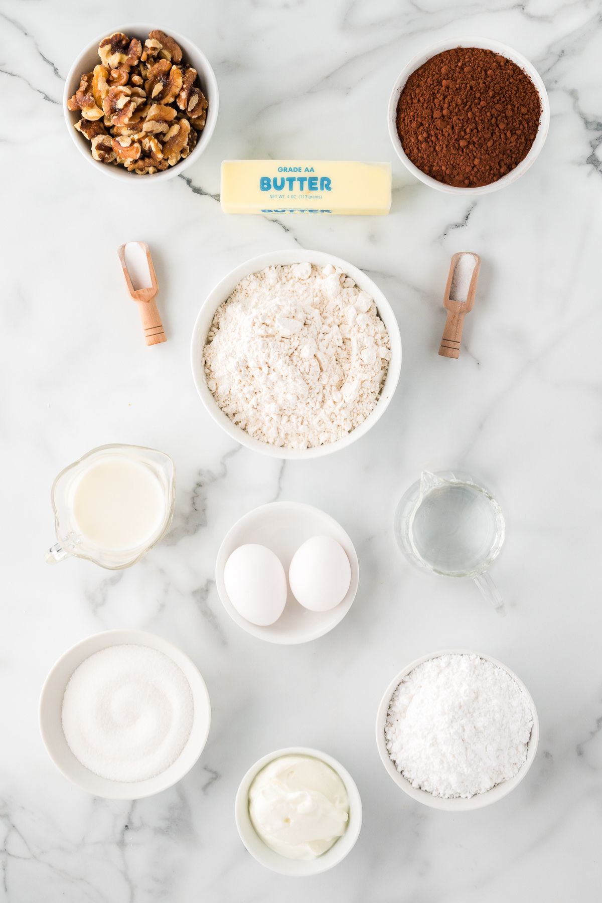 Cake flour, cocoa powder, butter, eggs, chopped walnuts, baking soda and cream.