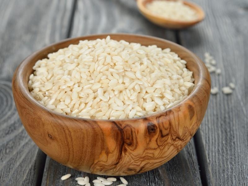 Arborio Rice on a Wooden Bowl