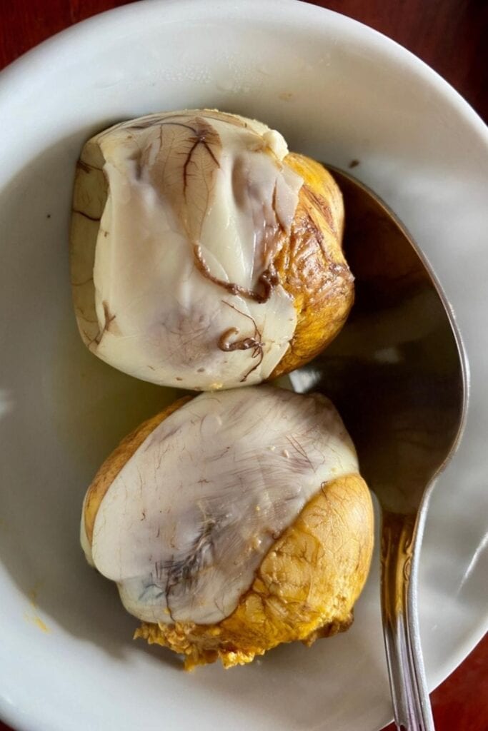 Cooked and Peeled Balut Served on a White Plate
