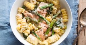 Bowl of Homemade Pasta with Asparagus, Salmon and Peas