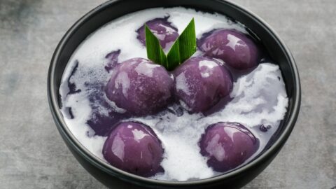 Bowl of Homemade Porridge with Purple Sweet Potatoes and Coconut Milk