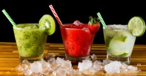 Cachaca Cocktails with Different Flavors: Lime, Kiwi and Strawberry