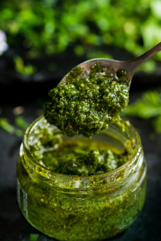 Carrot Top Pesto in a Glass Container