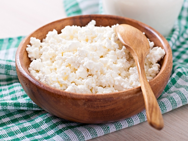 Cottage Cheese on a Wooden Bowl