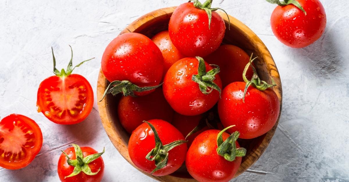 Fresh Red Tomatoes in a Wooden Bowl