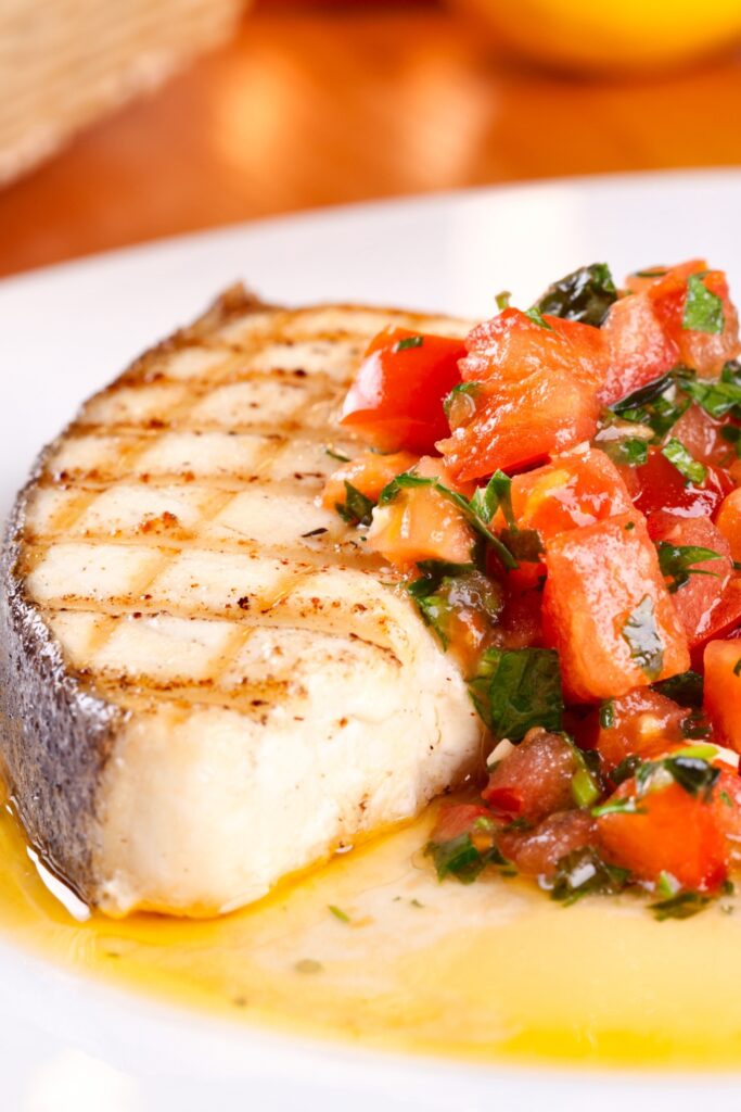 Grilled Corvina Fish with Tomatoes