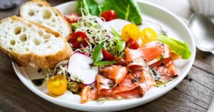Healthy Alfalfa Sprout Salad with Salmon, Cherry Tomatoes and Bread