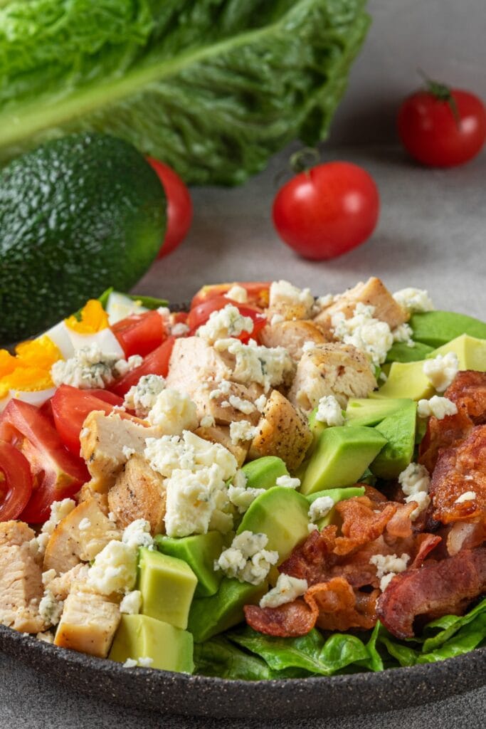 Homemade Cobb Salad with Bacon, Chicken, Avocados and Tomatoes