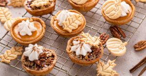 Homemade Mini Pumpkin Pie with Pecans and Whipped Cream