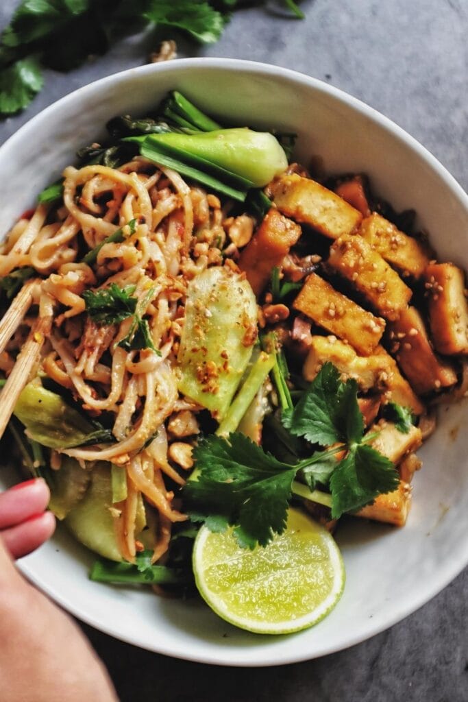 Homemade Tofu Pad Thai with Lime in a Bowl