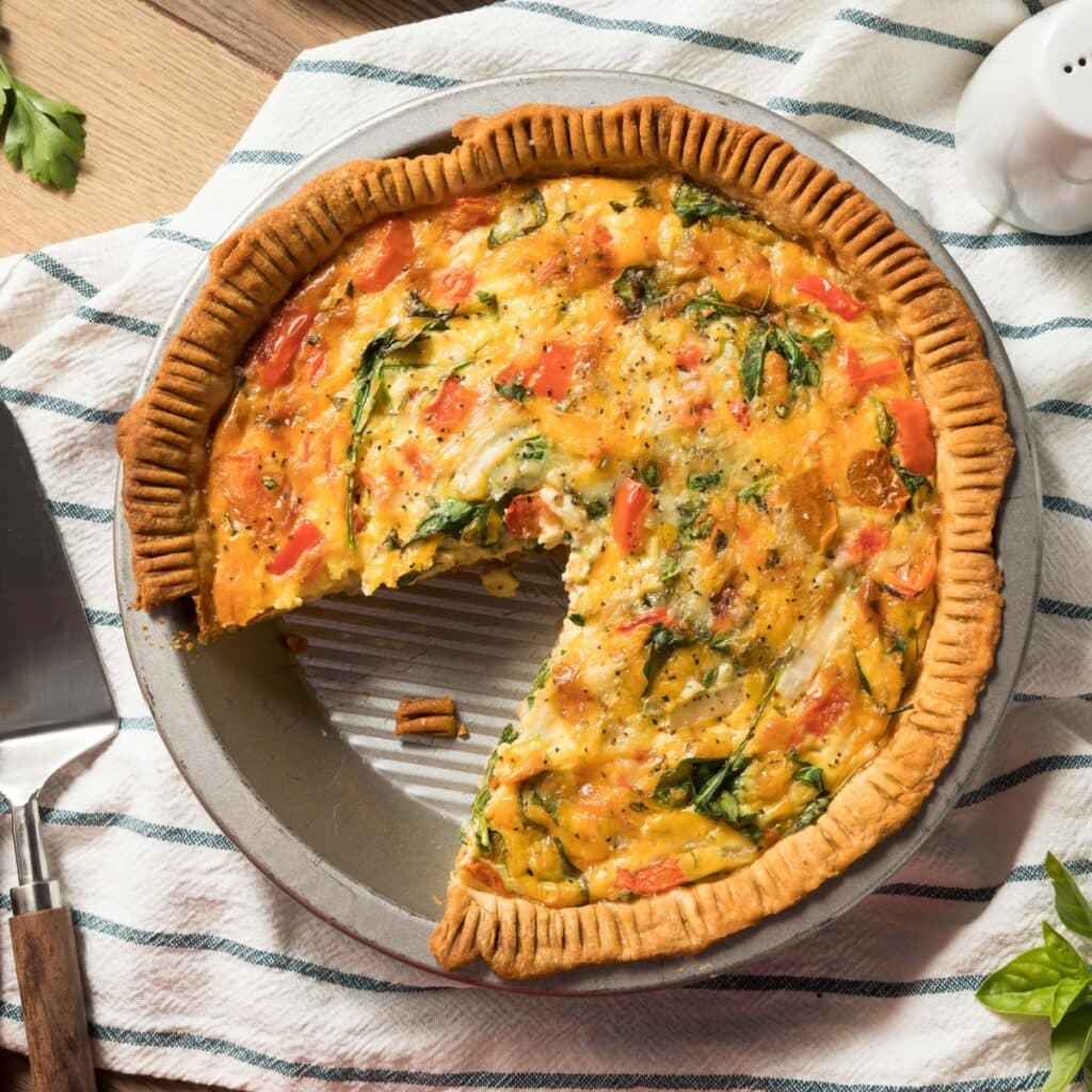 Homemade Vegetable Quiche with Spinach and Tomatoes