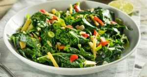 Homemade Sauteed Kale with Greens in a White Plate