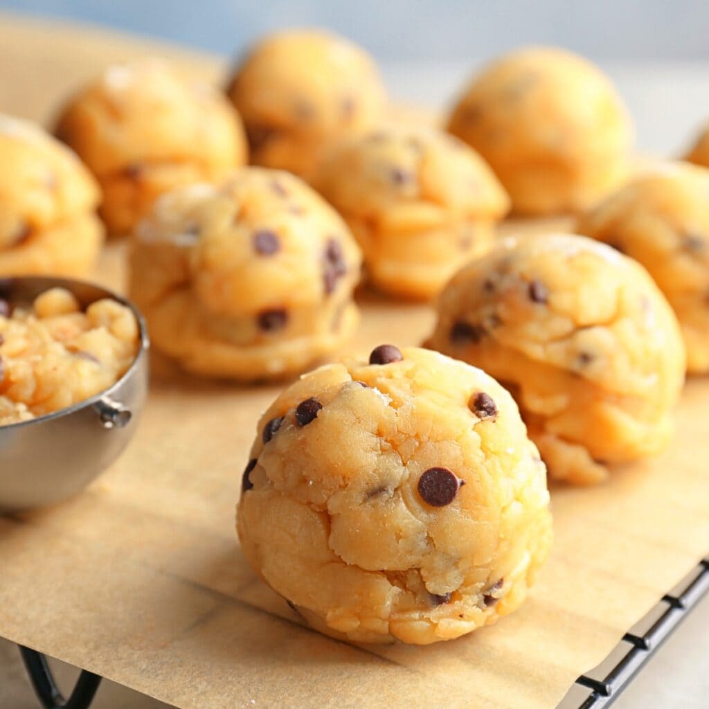Cookie Doughs Laid on a Top of Parchment Paper on a Baking Rack