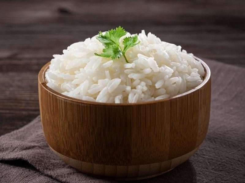 Cooked Jasmine Rice on a Wooden Bowl 