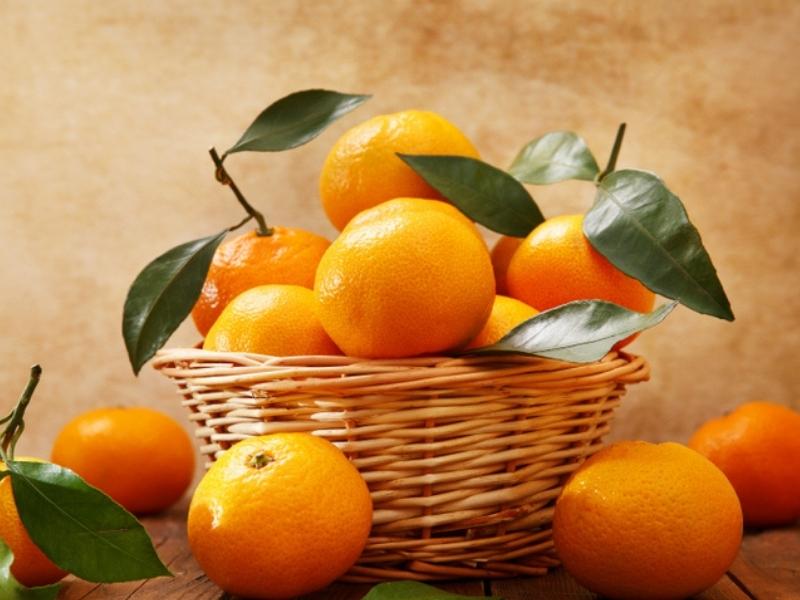 Fresh Mandarin Oranges on a Woven Basket