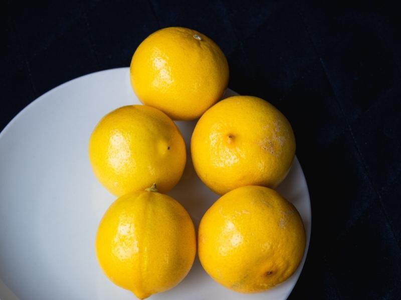 Mediterranean Sweet Lemons on a White Plate