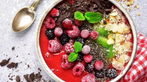 Raspberry Smoothie Bowl with Chia Seeds, Chocolate, Kiwi and Almonds