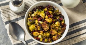 Roasted Brussels Sprout with Cranberries in a White Bowl