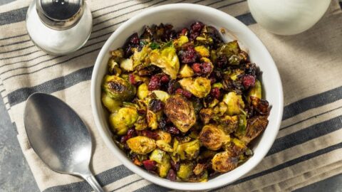 Roasted Brussels Sprout with Cranberries in a White Bowl
