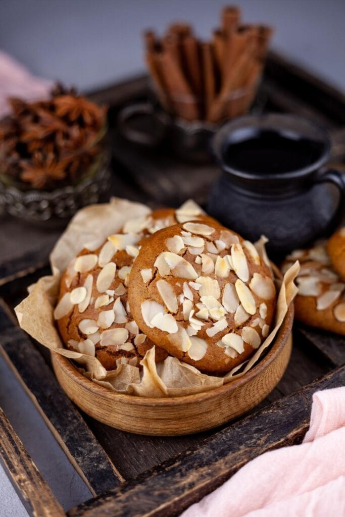 Sweet Almond Cookies with Cinnamon in a Wooden Bowl