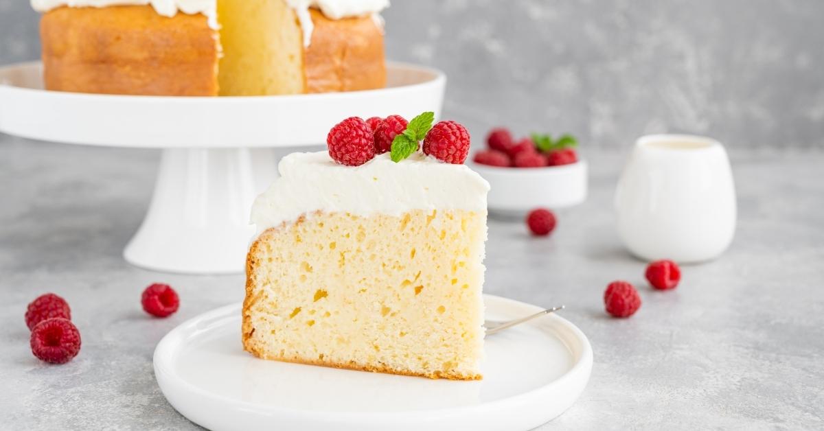 Sweet Homemade Tres Leches White Cake with Raspberries