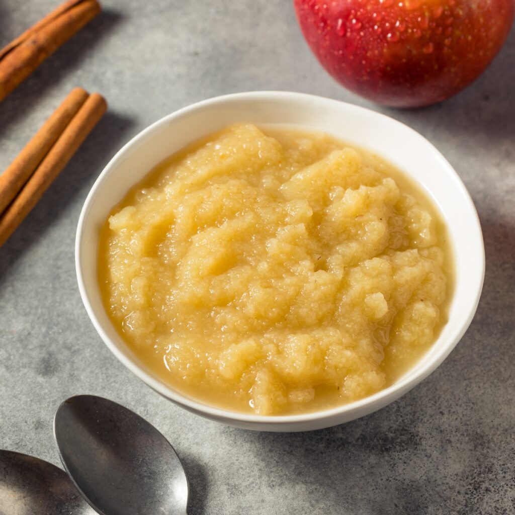 Apple Sauce in a White Bowl with Cinanmon
