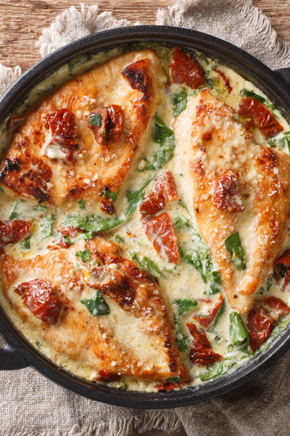 Baked Chicken with Sun-Dried Tomatoes, Spinach and Creamy Sauce