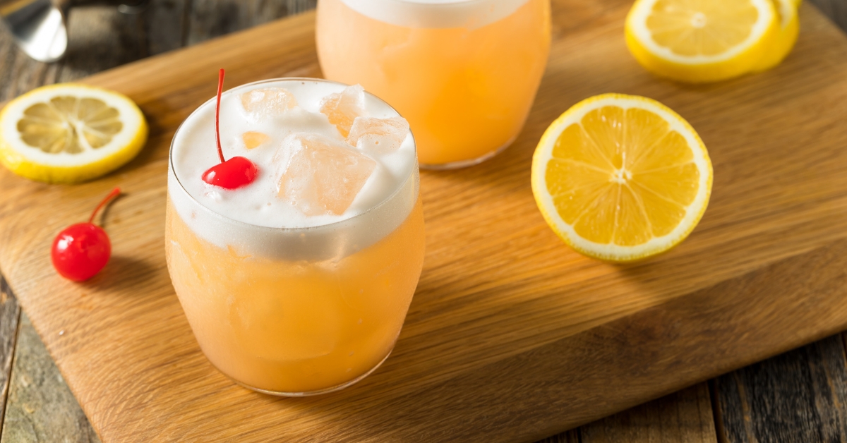 Boozy Refreshing Homemade Low-Sugar Whiskey Sour with Cherry and Lemons