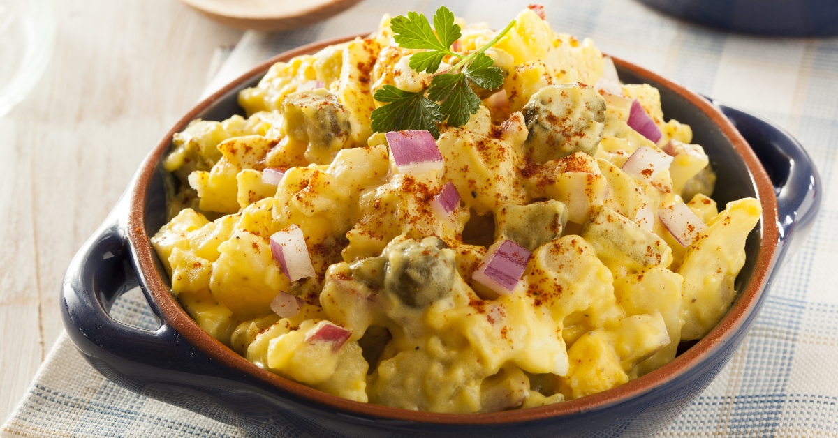 Bowl of Homemade Potato Salad with Onions and Eggs