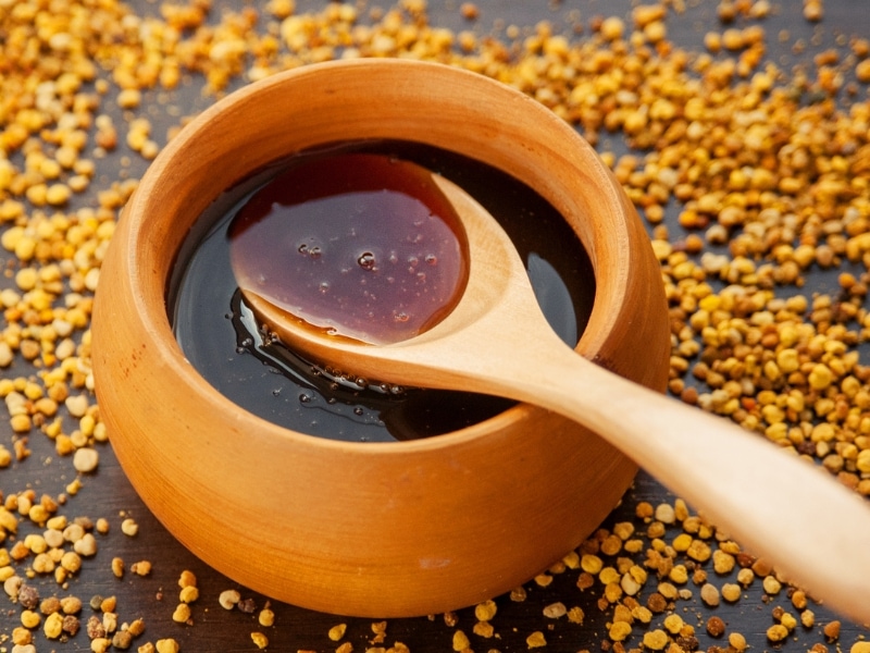 Buckwheat Honey in a Wooden Bowl 