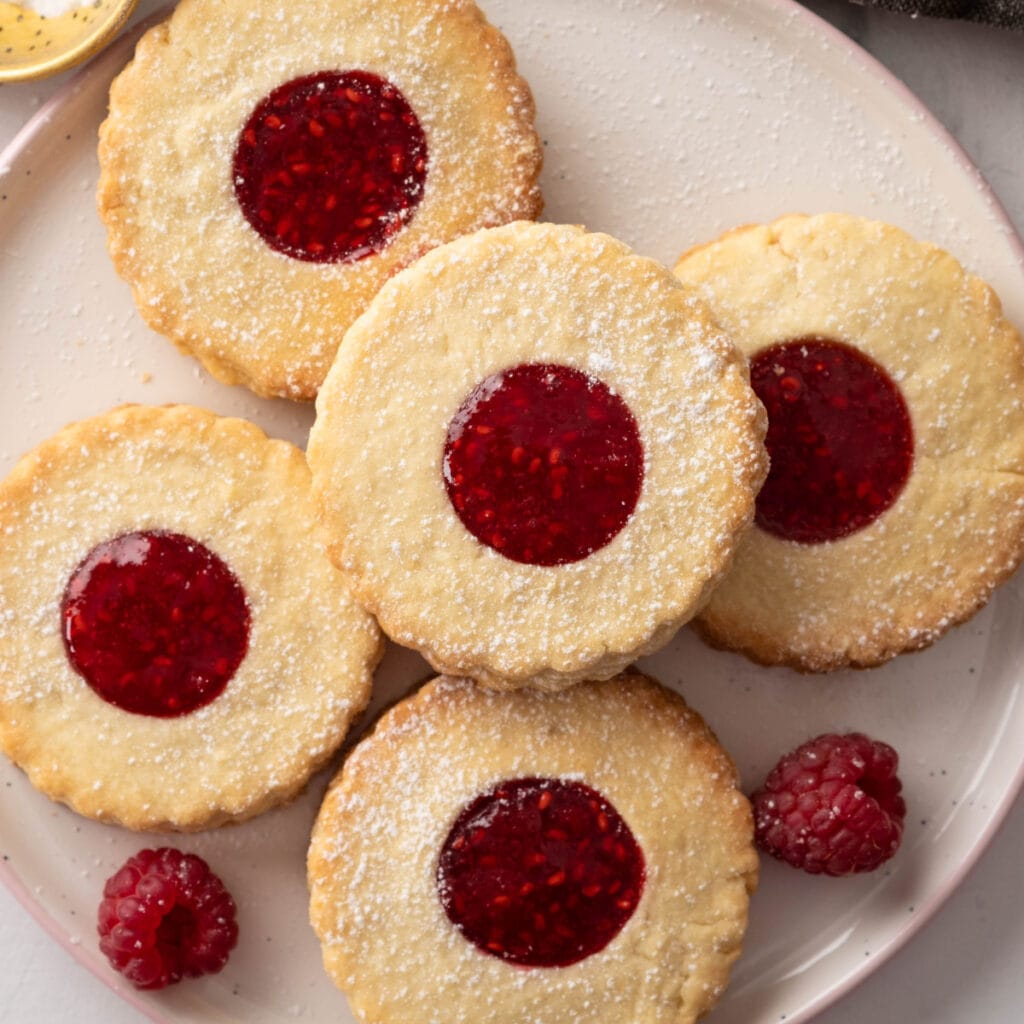 Classic Linzer Cookies on a White Plate
