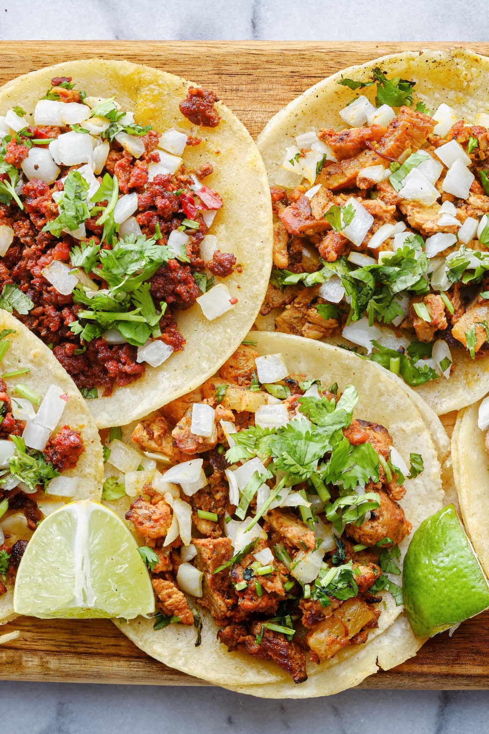 Different Types of Pork and Beef Tacos with Lime
