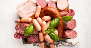 Different Types of Raw Sausages with Salami and Smoked Meat