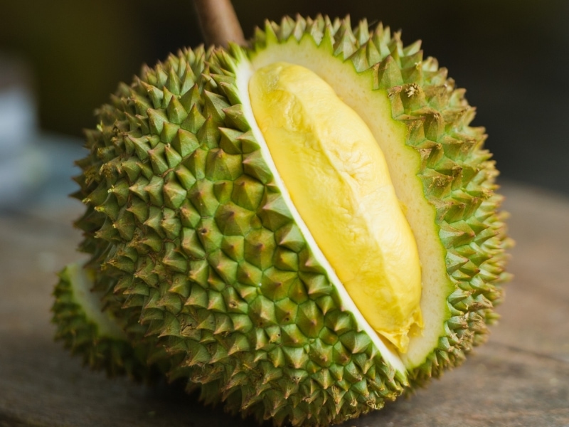 Durian Fruit Peeled on a Wooden Table