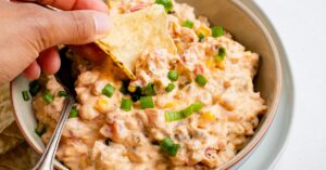 Homemade Creamy Potato Chip Dip with Green Onions in a Bowl
