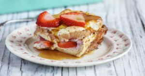 Homemade French Toast Casserole Topped with Fresh Strawberries