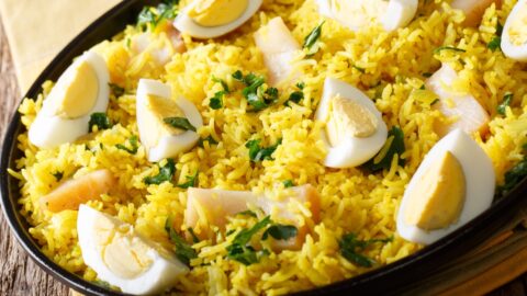 Homemade Kedgeree with Rice, Egg and Smoked Haddock in a Black Plate