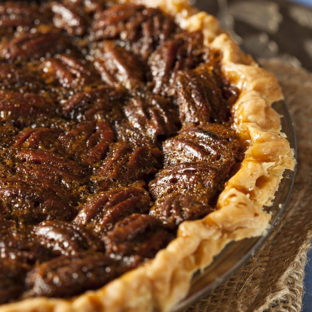 Homemade Texas Pecan Pie in a Glass Plate
