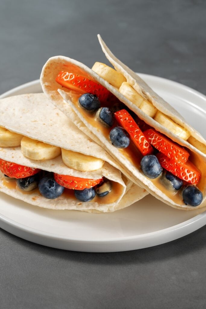 Homemade Tortillas Filled with Banana, Blueberry and Strawberries