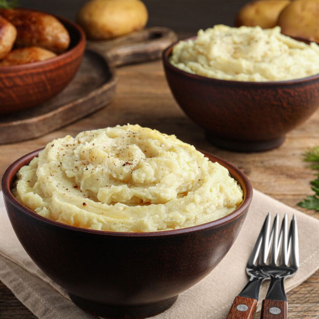 Ina Garten’s Mashed Potatoes on a Brown Bowl
