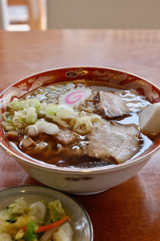 Kitakata Ramen in a Red Bowl on a Wooden Table