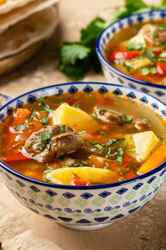 Lamb Soup with Spices and Vegetables in a Bowl