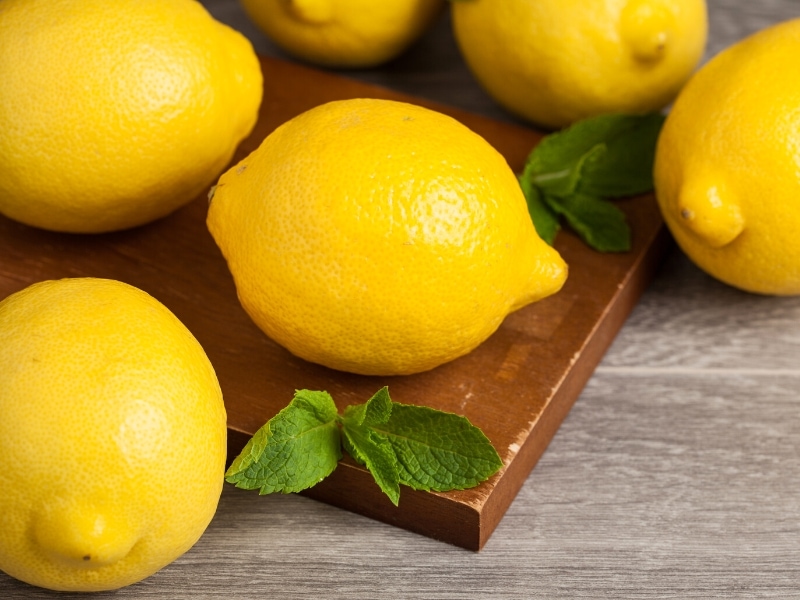 Fresh Lemons on Wooden Table