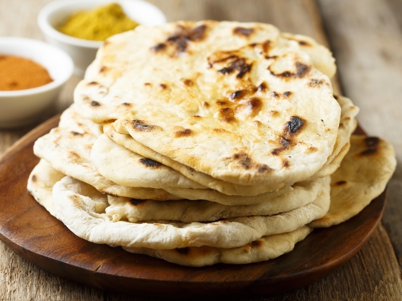 Naan Bread on a Wooden Plate