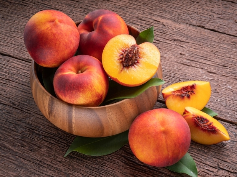 Nectarines on Wooden Bowl
