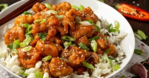 Orange Chicken with Sesame Seeds, Green Onions and Rice