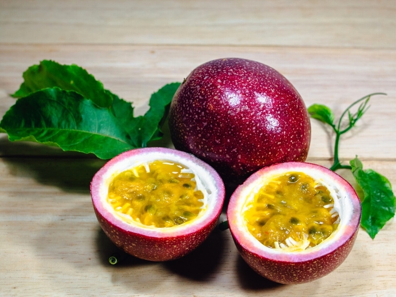 Whole and Sliced Passionfruit