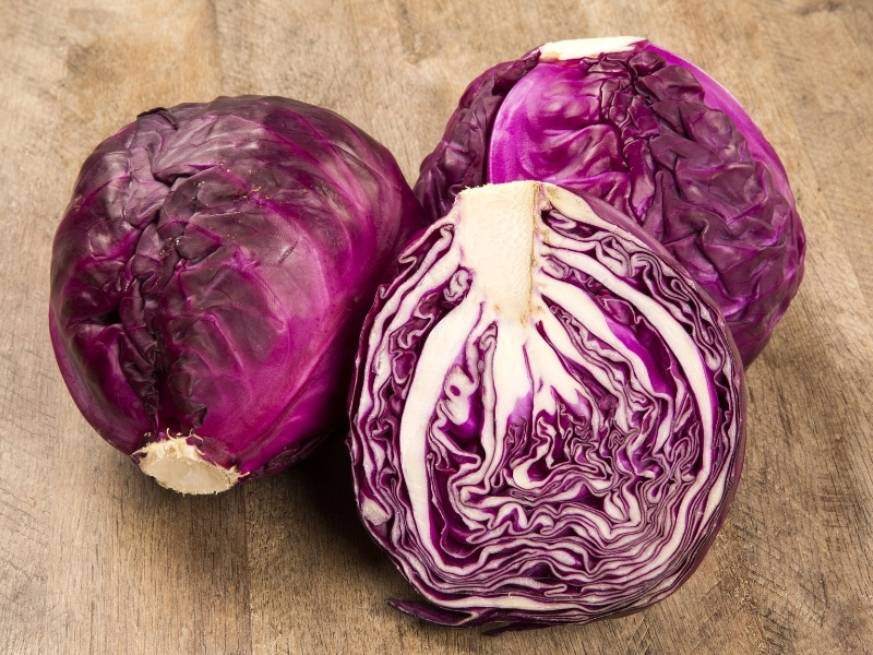 Whole and Sliced Red Cabbages
